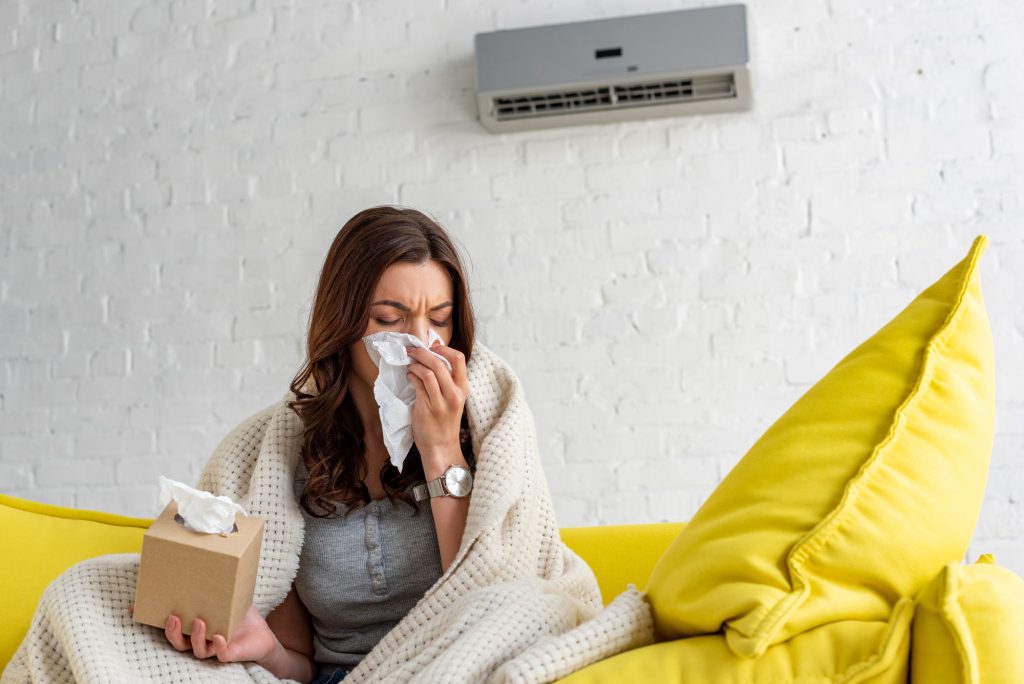 Objawy alergii przy klimatyzacji w biurze kaszel i lzawienie oczu w biurze